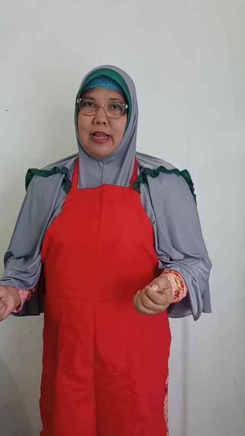 Nama :Husna Wartabone, Umur :48, asal gorontalo, Nama masakan :Ikan Mujair Bilendango(Ikan belah rica).