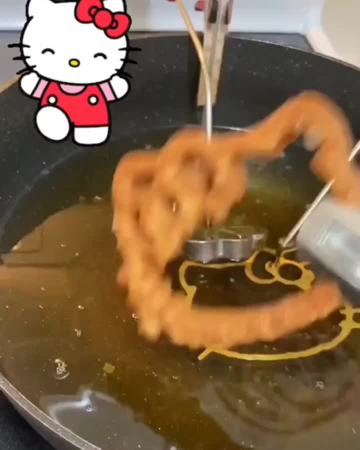 Kembang Goyang Bentuk Hello Kitty