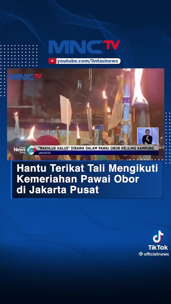hantu terikat tali mengikuti kemeriahan pawai obor