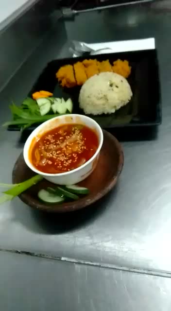 chiken karage sauce asam manis with butter rice.