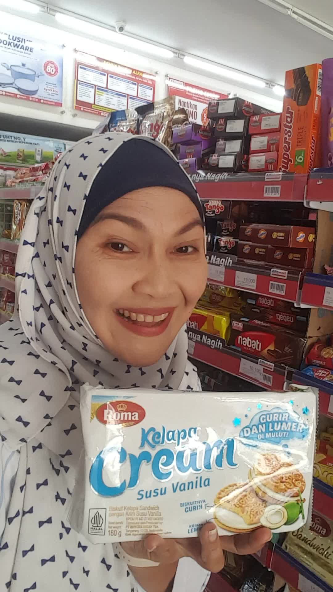Real Aty Ginting with Roma Kelapa Sandwich 